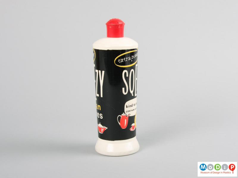 Side view of a Sqezy bottle showing the printed surface.