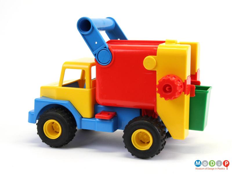 Rear view of a toy truck showing the bin at the back.
