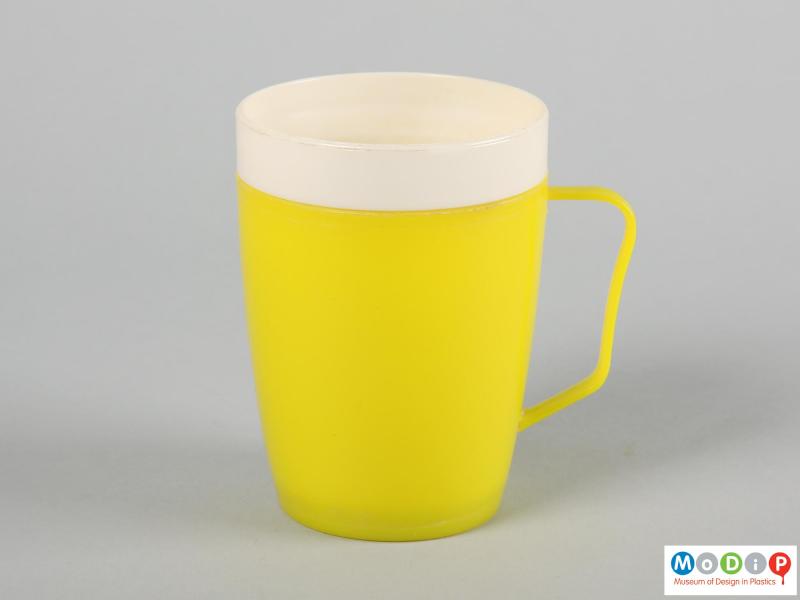 Side view of a mug showing the thin handle.