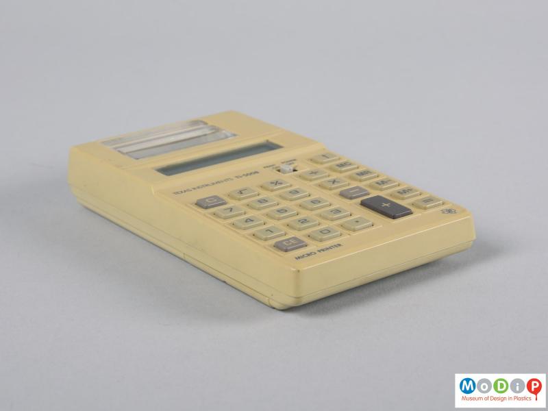 Side view of a calculator showing the smooth surface texture.