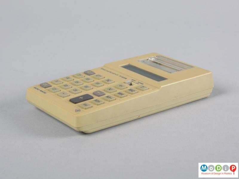 Side view of a calculator showing the smooth surface texture.