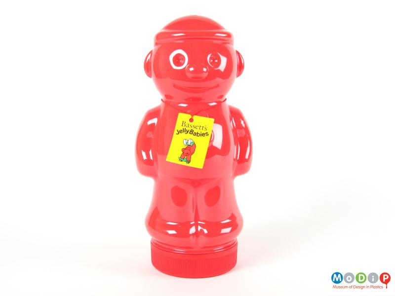 Front view of a Jelly Babies jar showing the features of the figure including ears, nose, arms and legs.