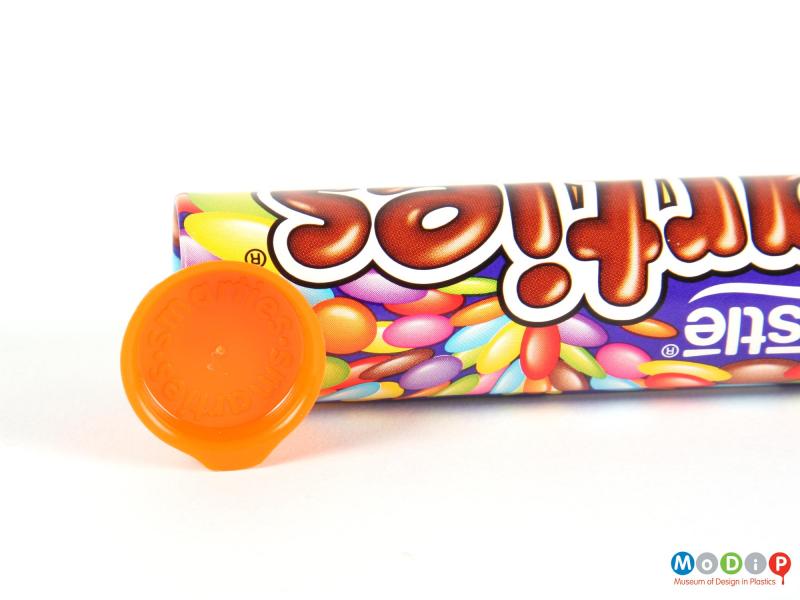 Top view of a Smarties tube showing the lid.