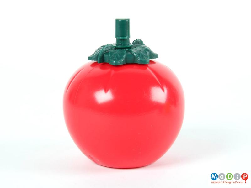 Side view of a tomato sauce bottle showing the spherical shape.