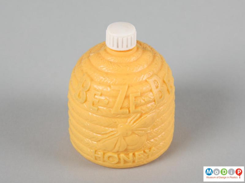 Top view of a Be Ze Be Honey bottle showing the screw-on lid.