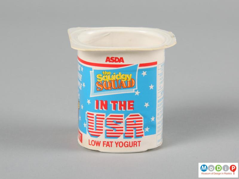 Side view of a yoghurt pot showing the printed label.