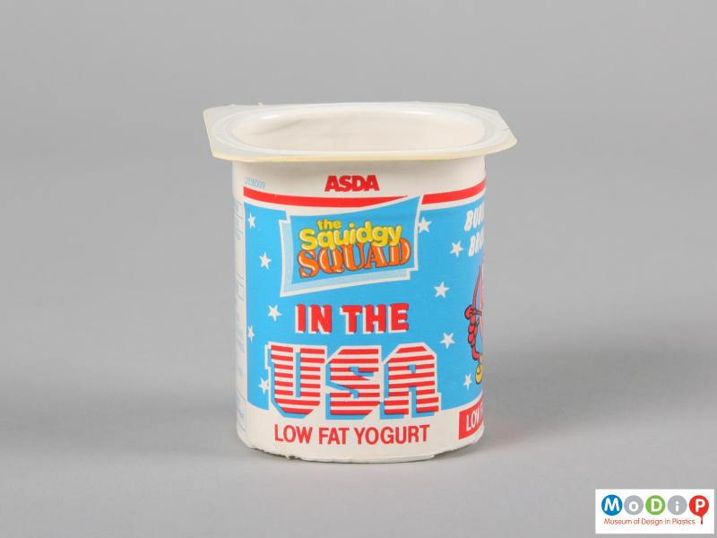 Side view of a yoghurt pot showing the printed label.