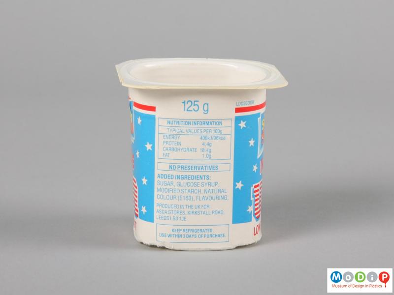 Side view of a yoghurt pot showing the printed label.