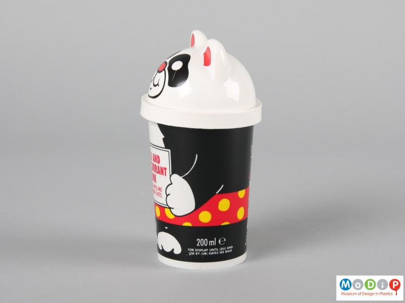 Side view of a Panda cup showing the printed feet and shorts.