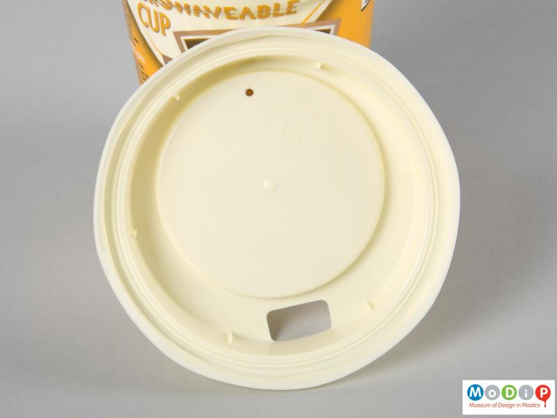 Side view of a Soup cup showing the inside surface of the lid.