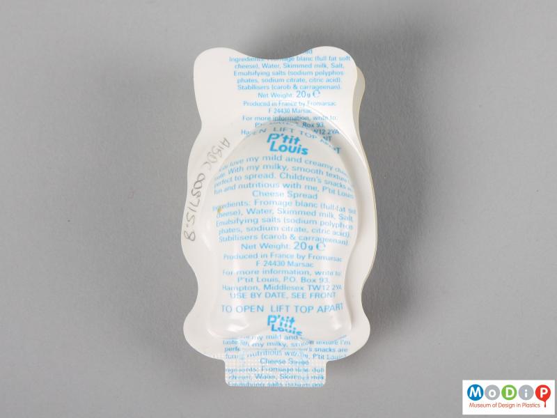 Rear view of a P'tit Louis cheese spread packet showing the printed information.