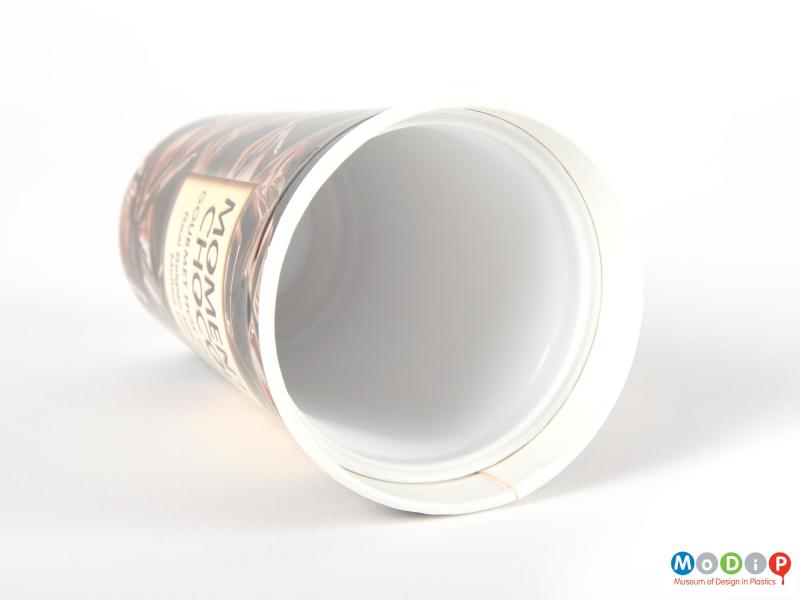 Close view of a Moment Du Chocolat cup showing the internal plastic cup.