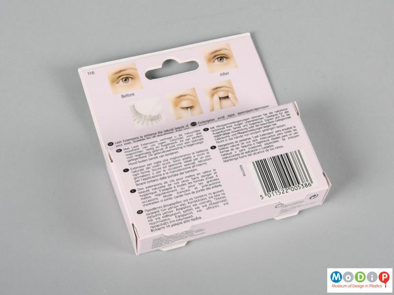 Rear view of a pair of false eyelashes showing the packaging.