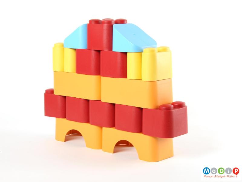 Side view of a set of building blocks showing a built structure.