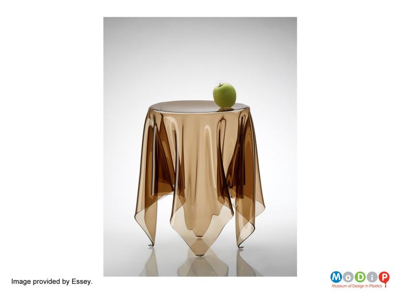 A publicity image of the Illusion table provided by Essey and showing a clear brown or gold example.