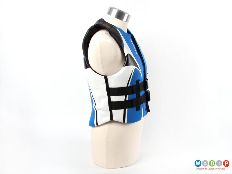 Side view of a Crewsaver buoyancy aid showing body shaping and the arm hole.