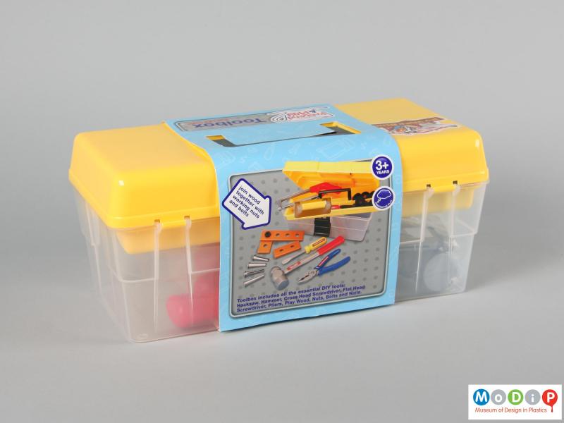 Rear view of a toy tool box showing the packaing slip around the box.