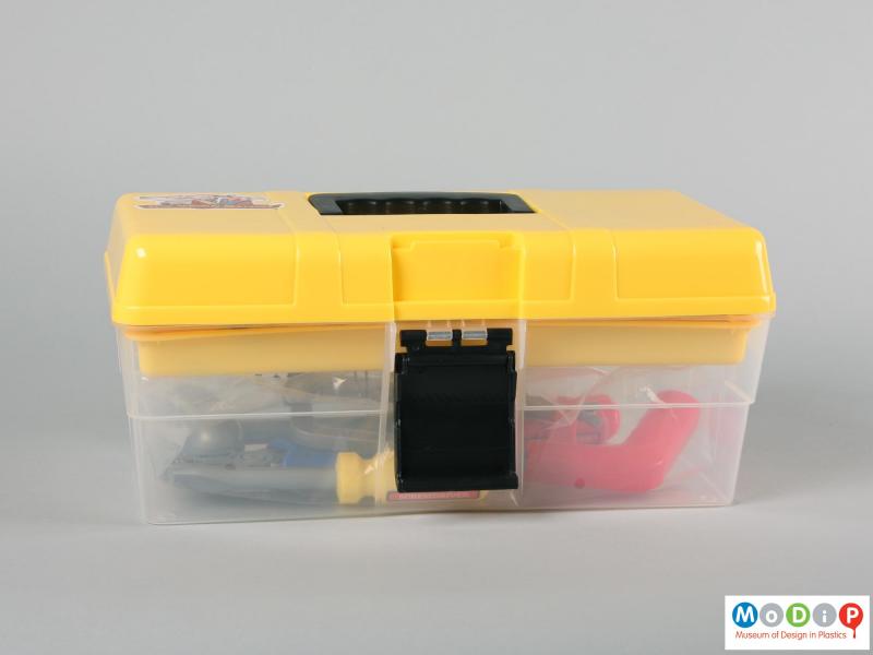 Front view of a toy tool box showing the carrying handle folded down and the closure clip open.