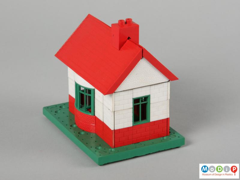 Side view of a building set showing a built house.