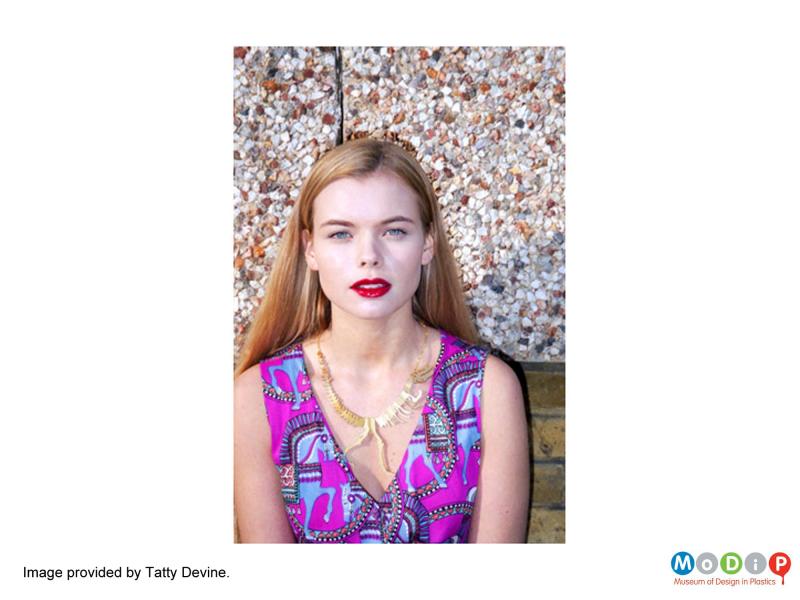 Front view of a Tatty Devine necklace showing the necklace being worn by a model. Image provided by Tatty Devine.