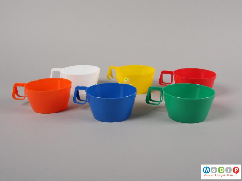 Side view of a set of cups showing them separated.