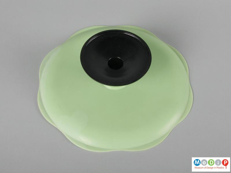 Underside view of a cake stand showing the two colours.
