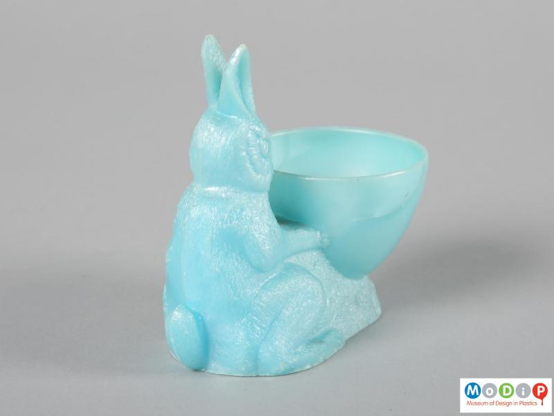 Rear view of an egg cup showing the moulde seam running down the rabbit's back.