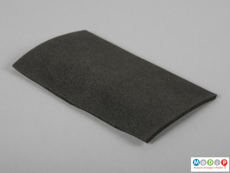 Side view of a foam sample showing the surface texture.