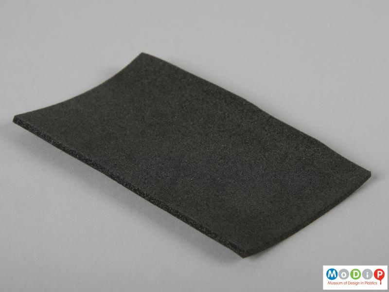 Side view of a foam sample showing the surface texture.