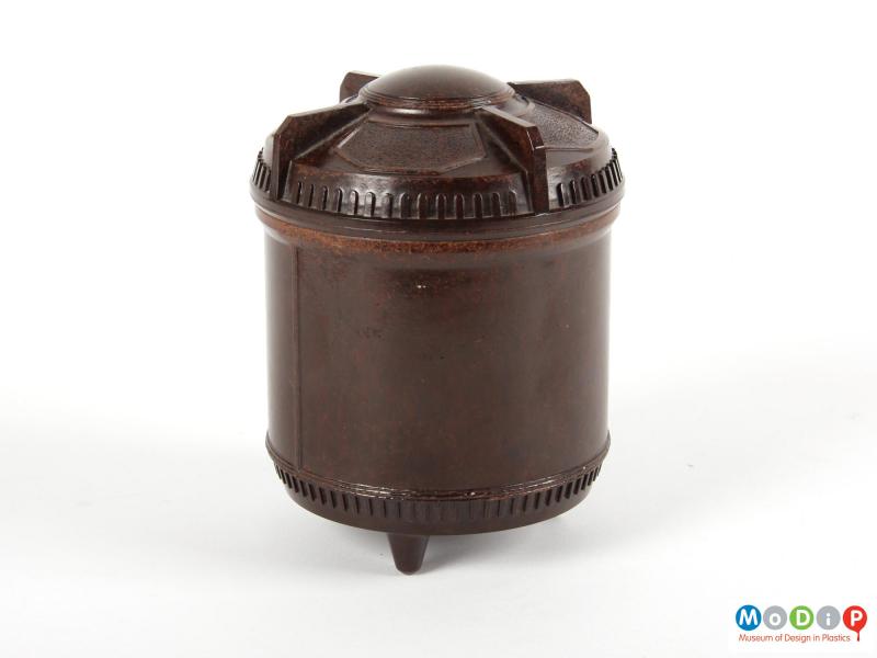 Side view of a tea caddy showing the grips moulded into the lid.