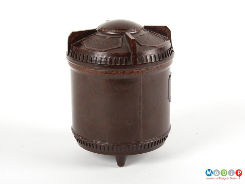 Side view of a tea caddy showing the grips moulded into the lid.