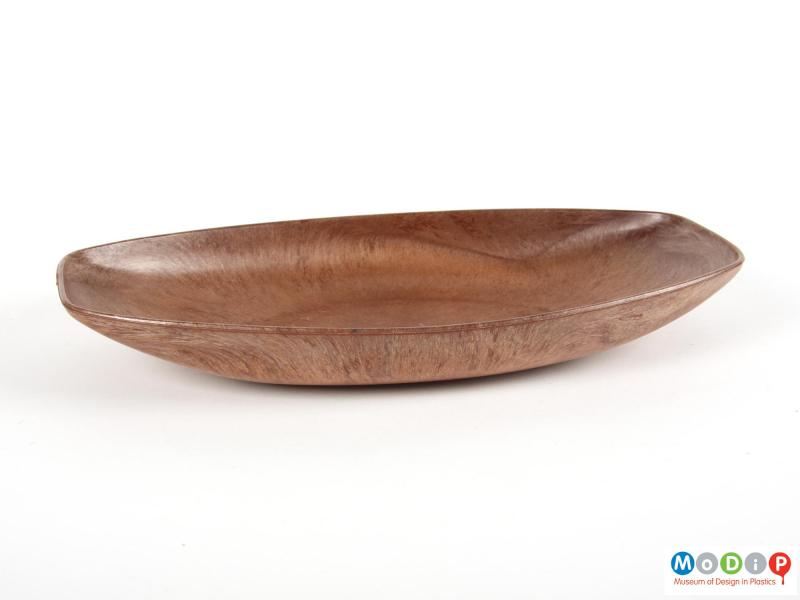 Side view of a dish showing the curving sides.