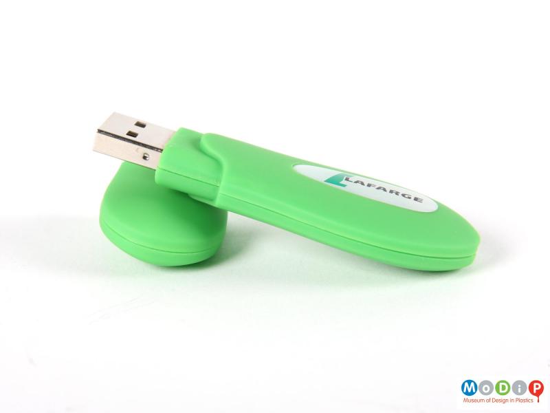 Side view of a USB stick showing the cap open.