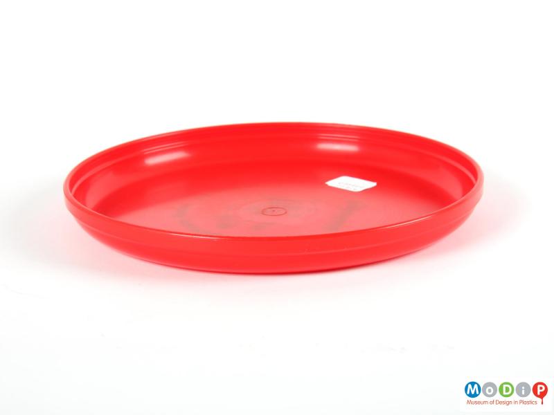 Side view of a frisbee showing the plain base.