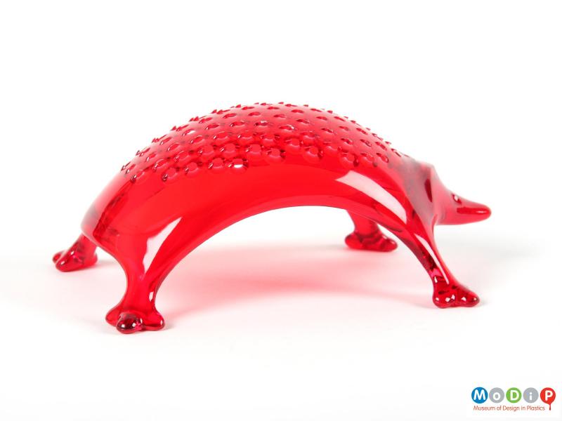 Side view of a grater showing the arched back of the hedgehog.
