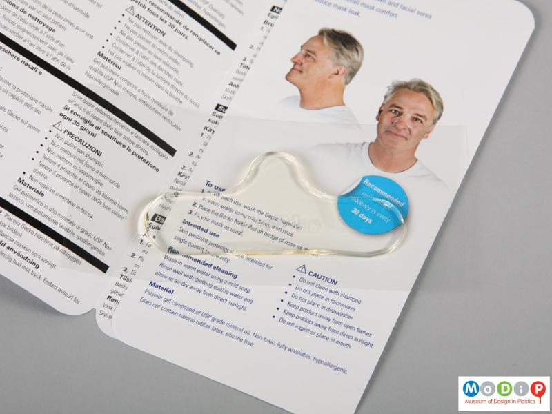 Front view of a nasal pad showing the literature.