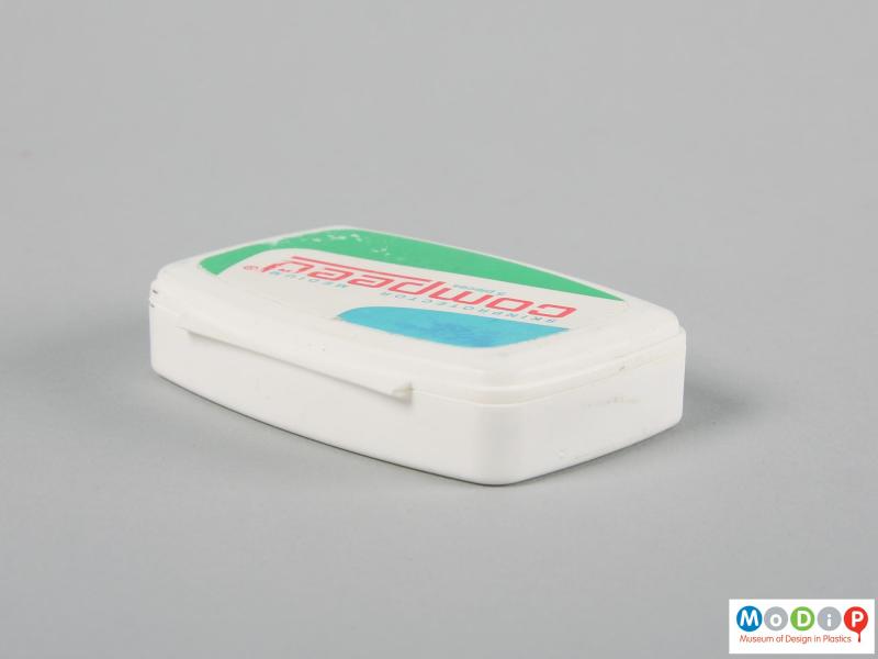 Rear view of a Compeed box showing the hinge.