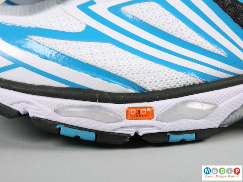 Close view of a pair of shoes showing the D3o logo.