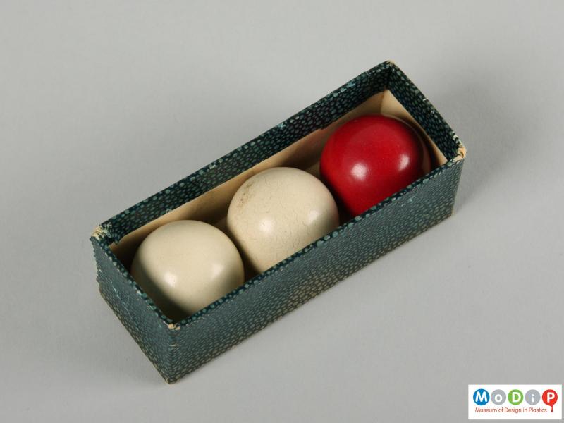 Top view of a set of balls showing the original packaing.