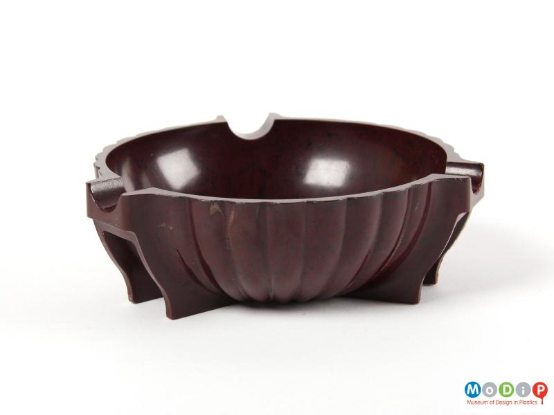 Side view of an ashtray showing the outer surface.