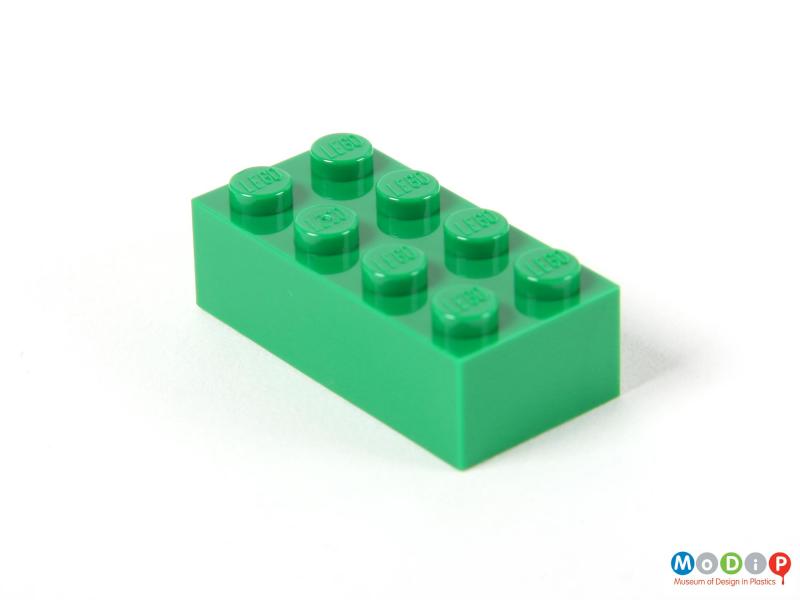 Side view of a Lego brick showing the pegs at the top.
