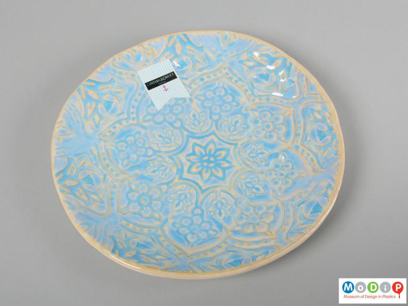 Front view of a plate showing the moulded patterning.