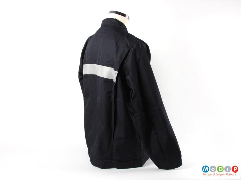 Rear view of a jacket showing the reflective back strip.