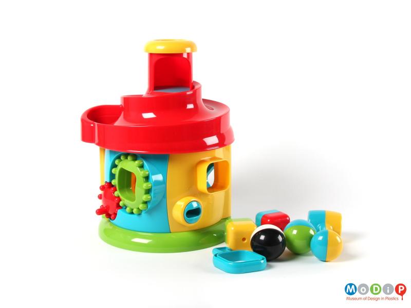Side view of an activity toy showing all the components.