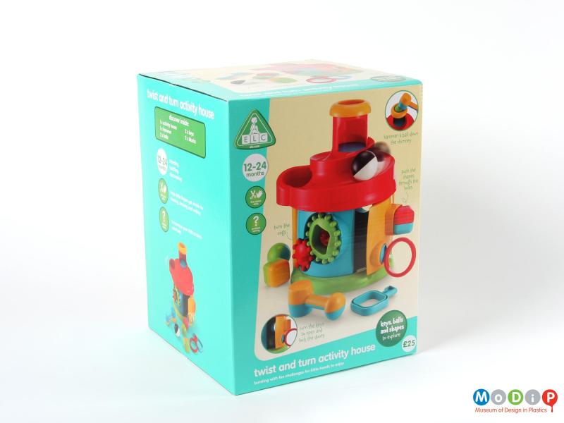 Side view of an activity toy showing the packaging.
