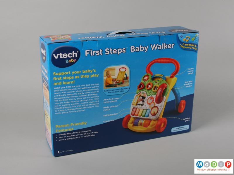 Side view of a walker toy showing the packaging.