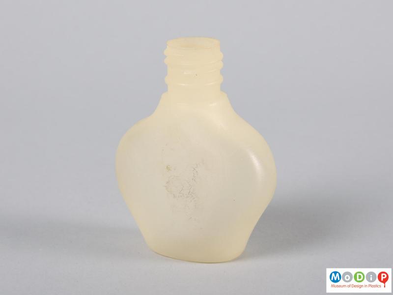 Rear view of a bottle showing the exaggerated shoulders.