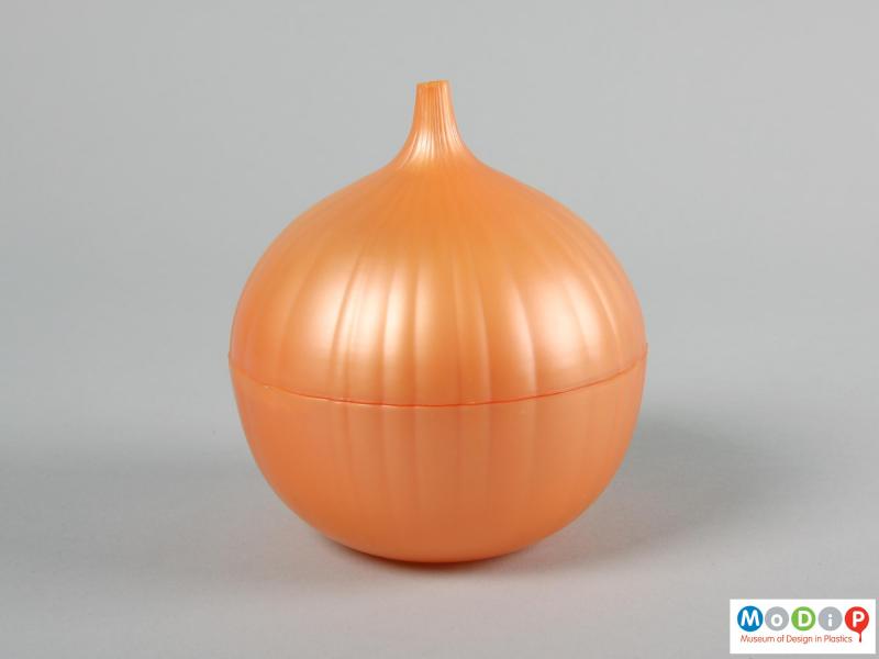 Side view of a container showing the onion shape.