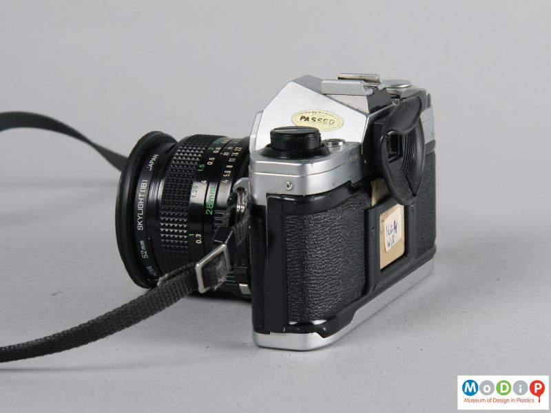 Side view of a camera showing the slim body.