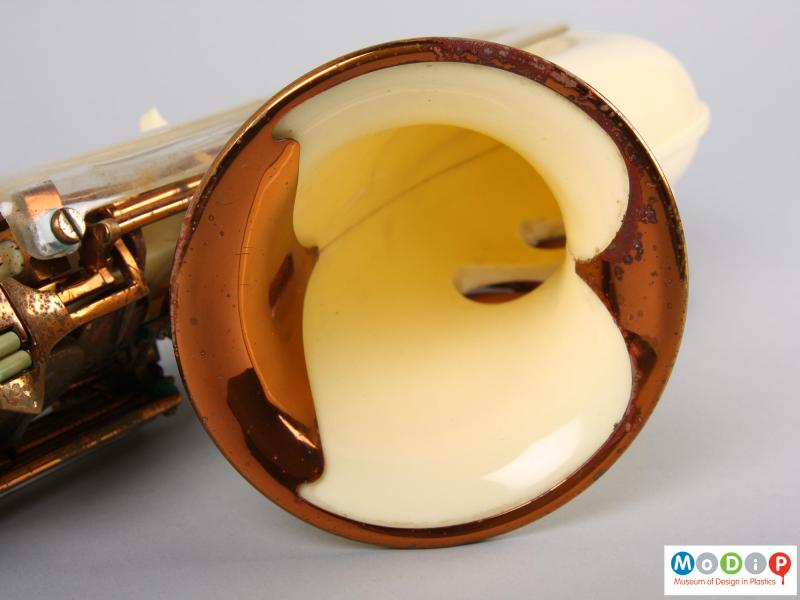 Close view of a saxophone showing the inside of the horn.
